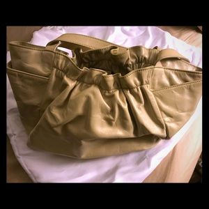 HOBO cream colored handbag.